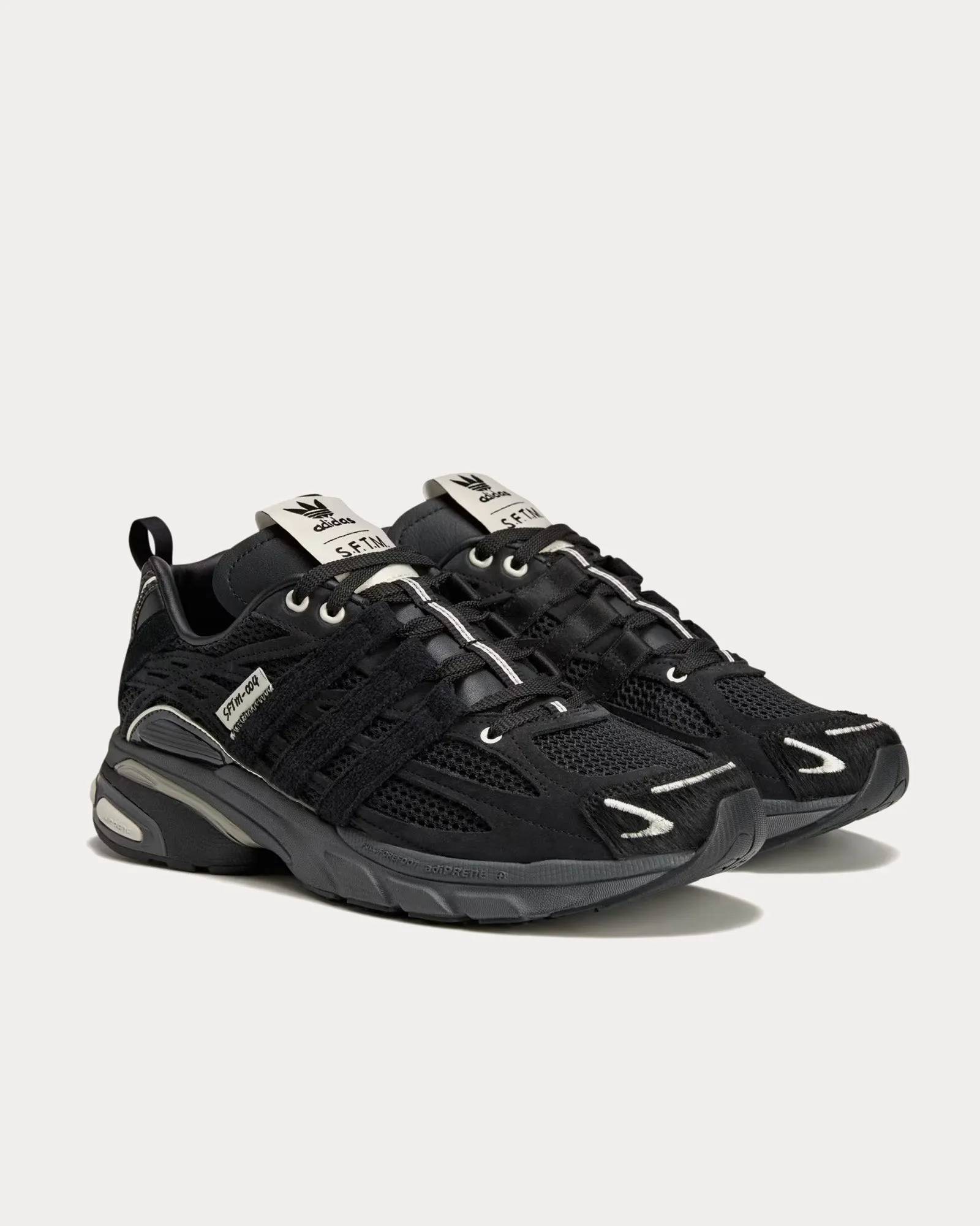 Adistar Cushion_SFTM_SS25 Core Black / Core Black / Cream White Low Top Sneakers